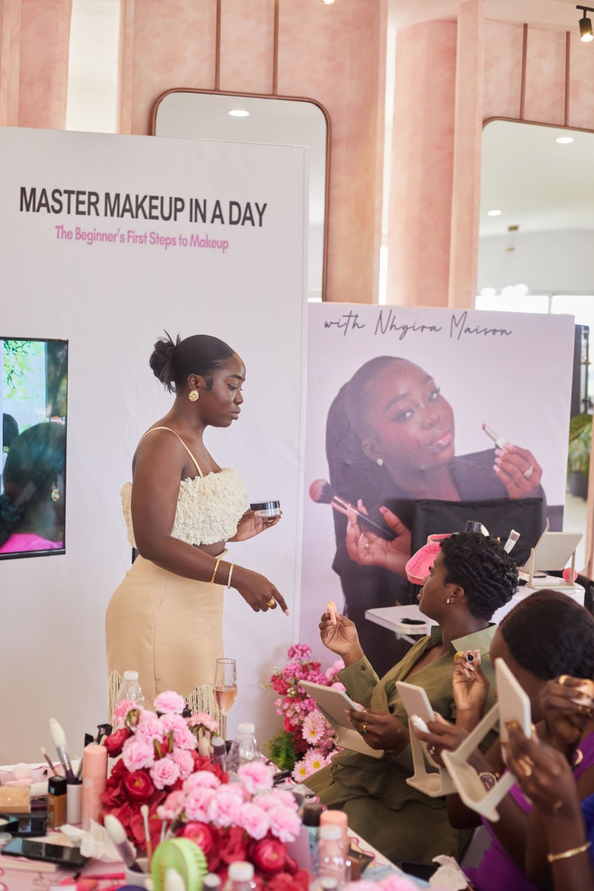 Nhyira presenting product to seated attendees during the demo