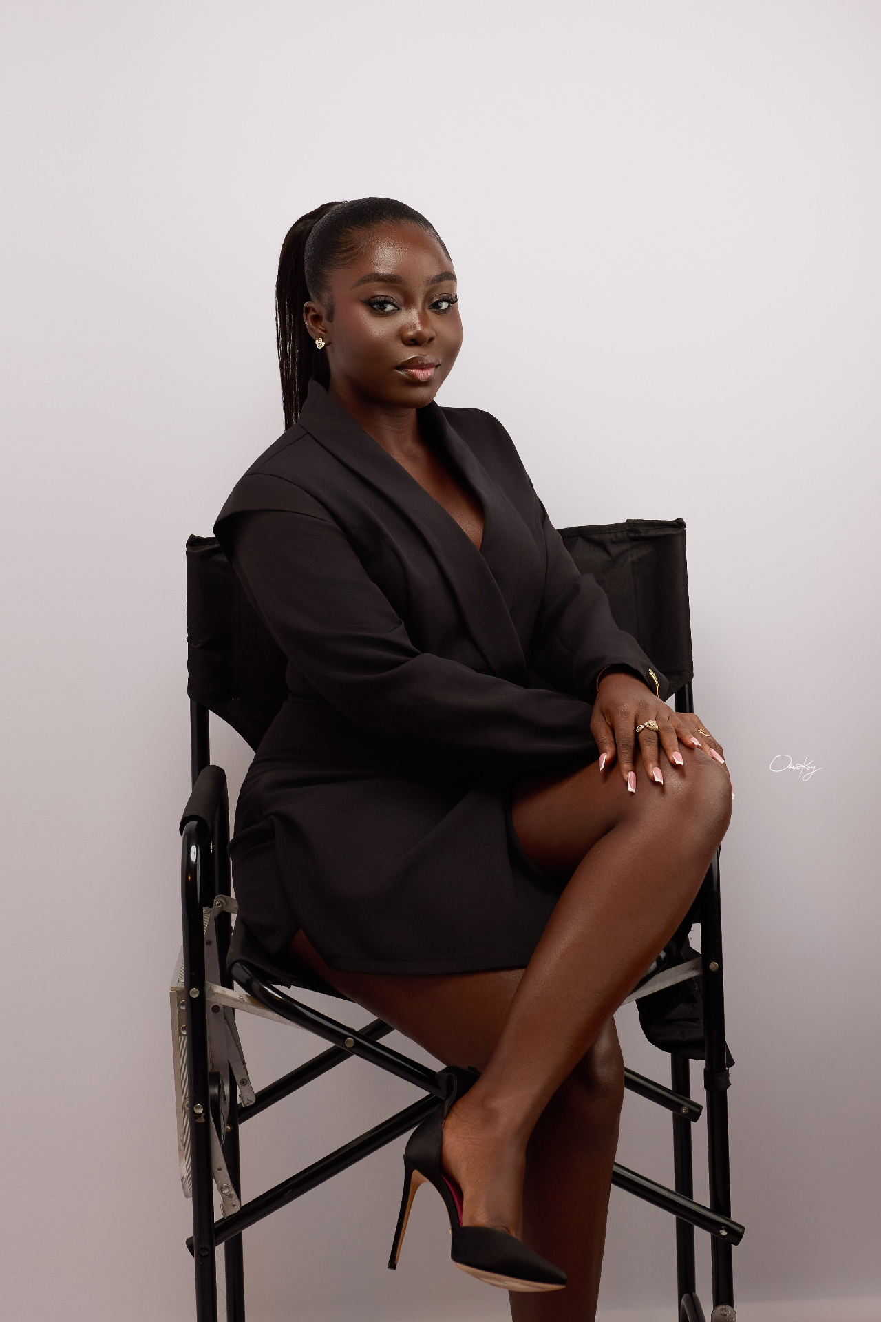 Nhyira Maison seated portrait